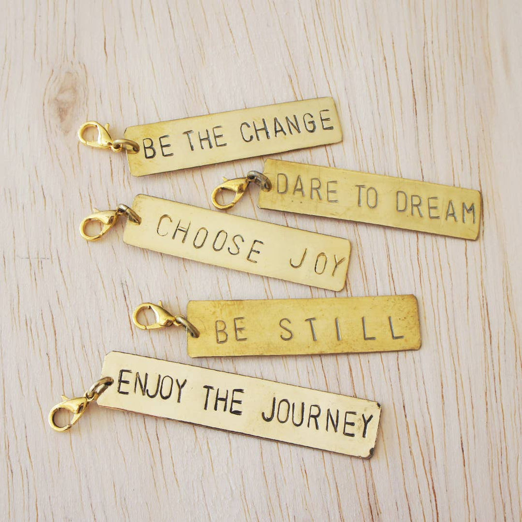 Be the Change Brass Charm
